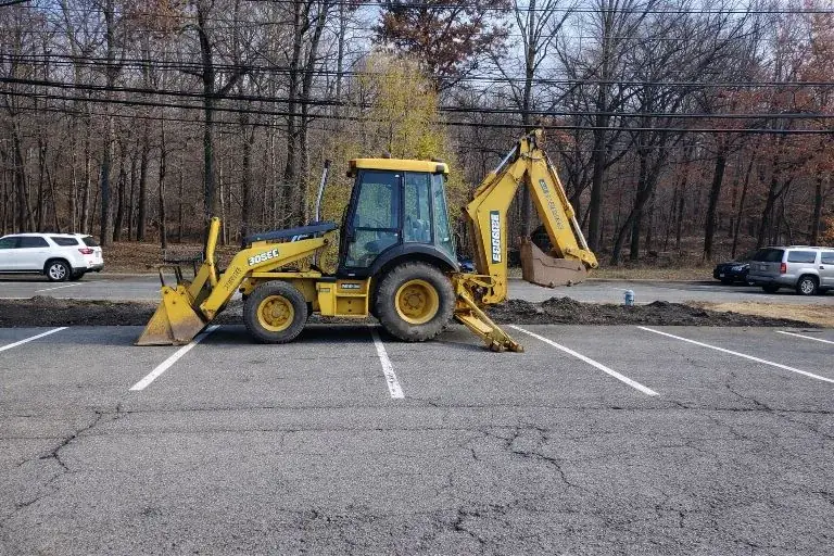 Backhoe excavation and parking lot site work by GradeCraft Excavation in New Jersey
